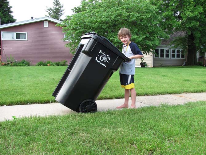 Child Taking Out Trash