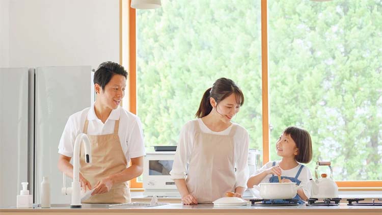 Child Helping With Dinner